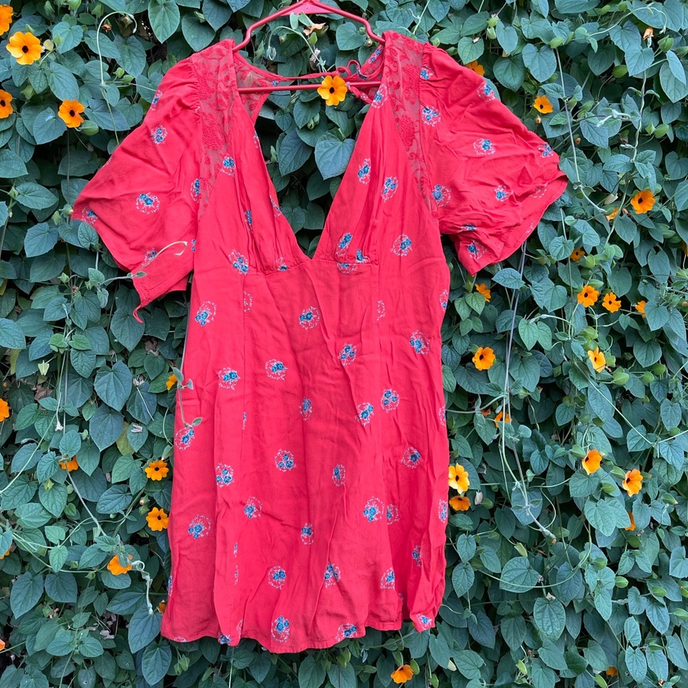 Plunging V front shoulder lace detail radically orang/red mini dress open back